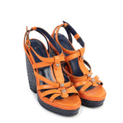 Buy authentic second hand Balenciaga Giant Studded Orange Wedge Heels - size 38 in good condition at Labellov in Antwerp.