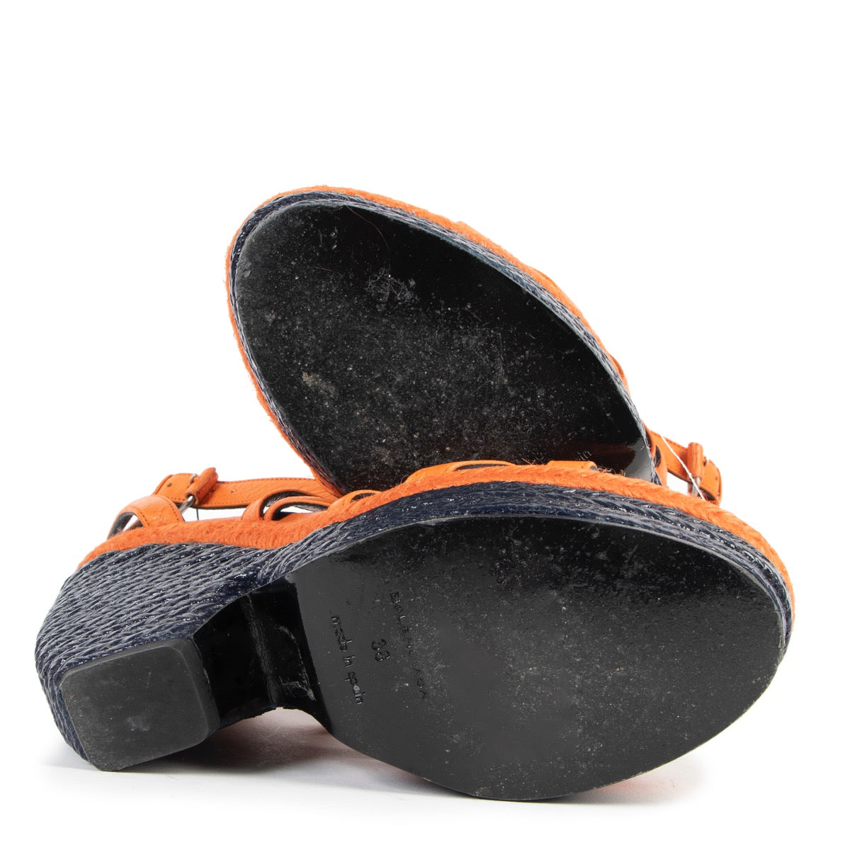 Buy authentic second hand Balenciaga Giant Studded Orange Wedge Heels - size 38 in good condition at Labellov in Antwerp.