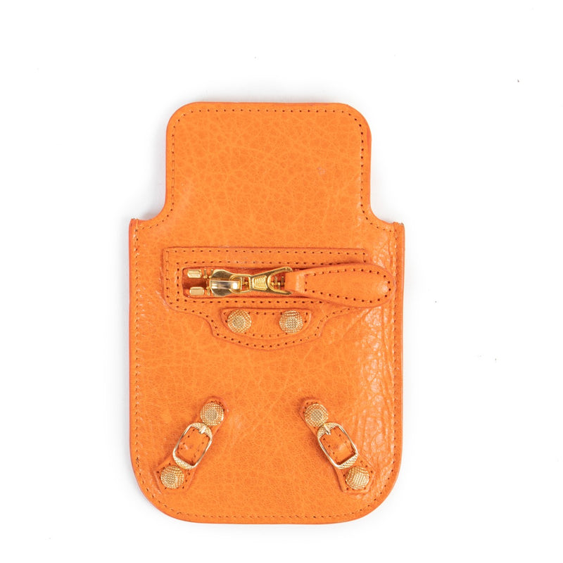 Buy authentic second hand Balenciaga Orange Leather Studded Phone Case in good condition at Labellov in Antwerp.