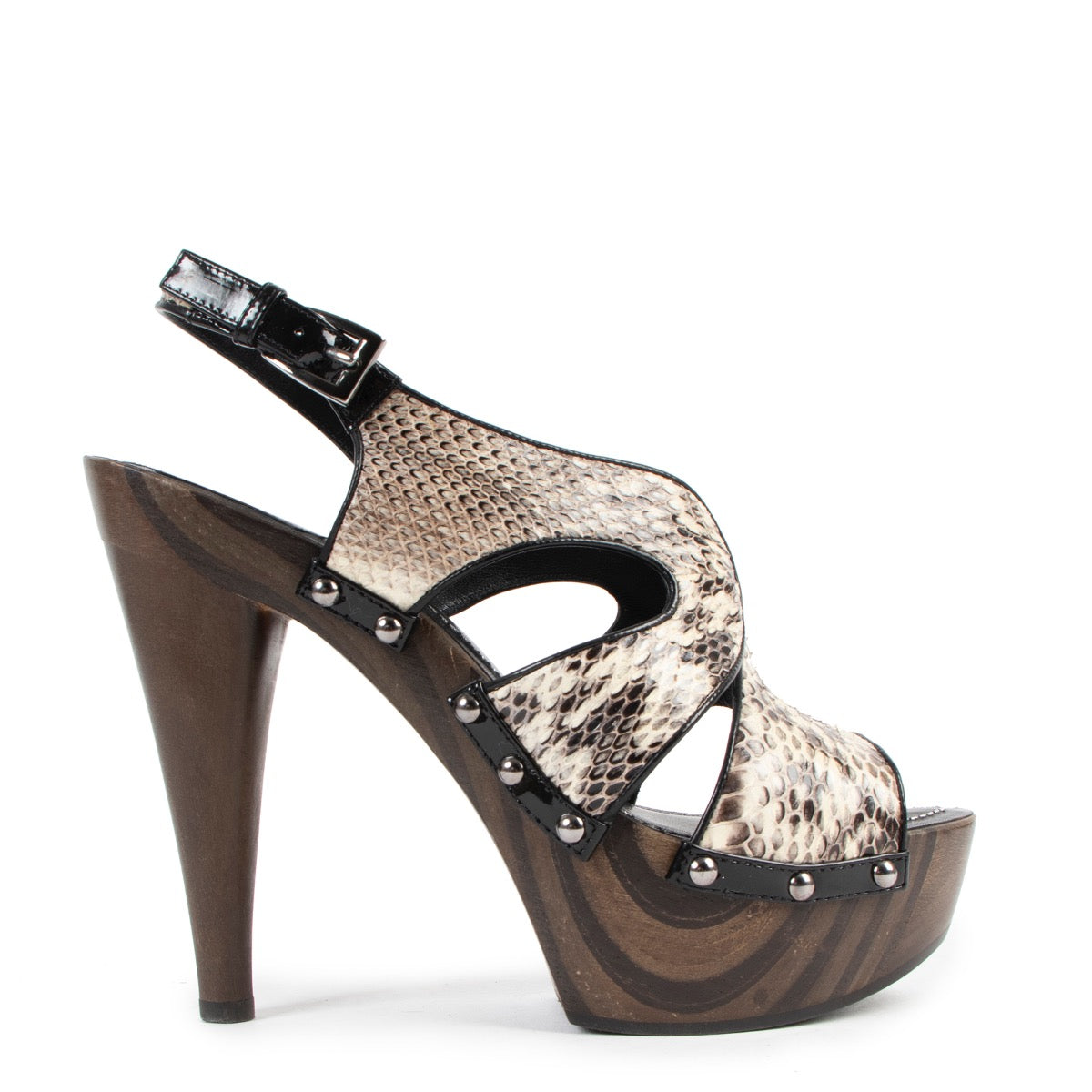 Buy authentic second hand Christian Dior Beige Python wooden High Heels - Size 38,5 in very good condition at Labellov in Antwerp.