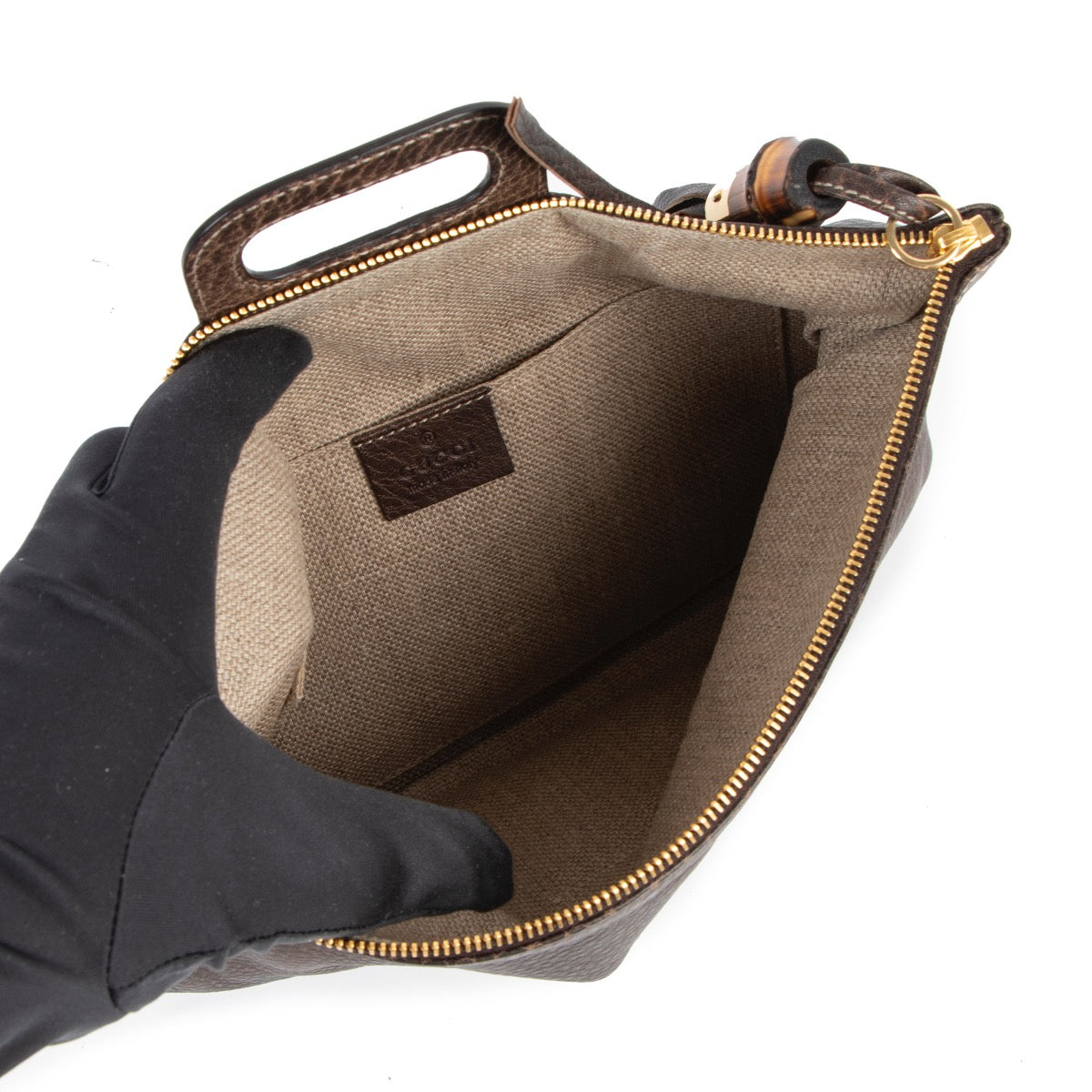 Shop safe online at Labellov in Antwerp this 100% authentic second hand Gucci Brown Leather Bamboo Clutch