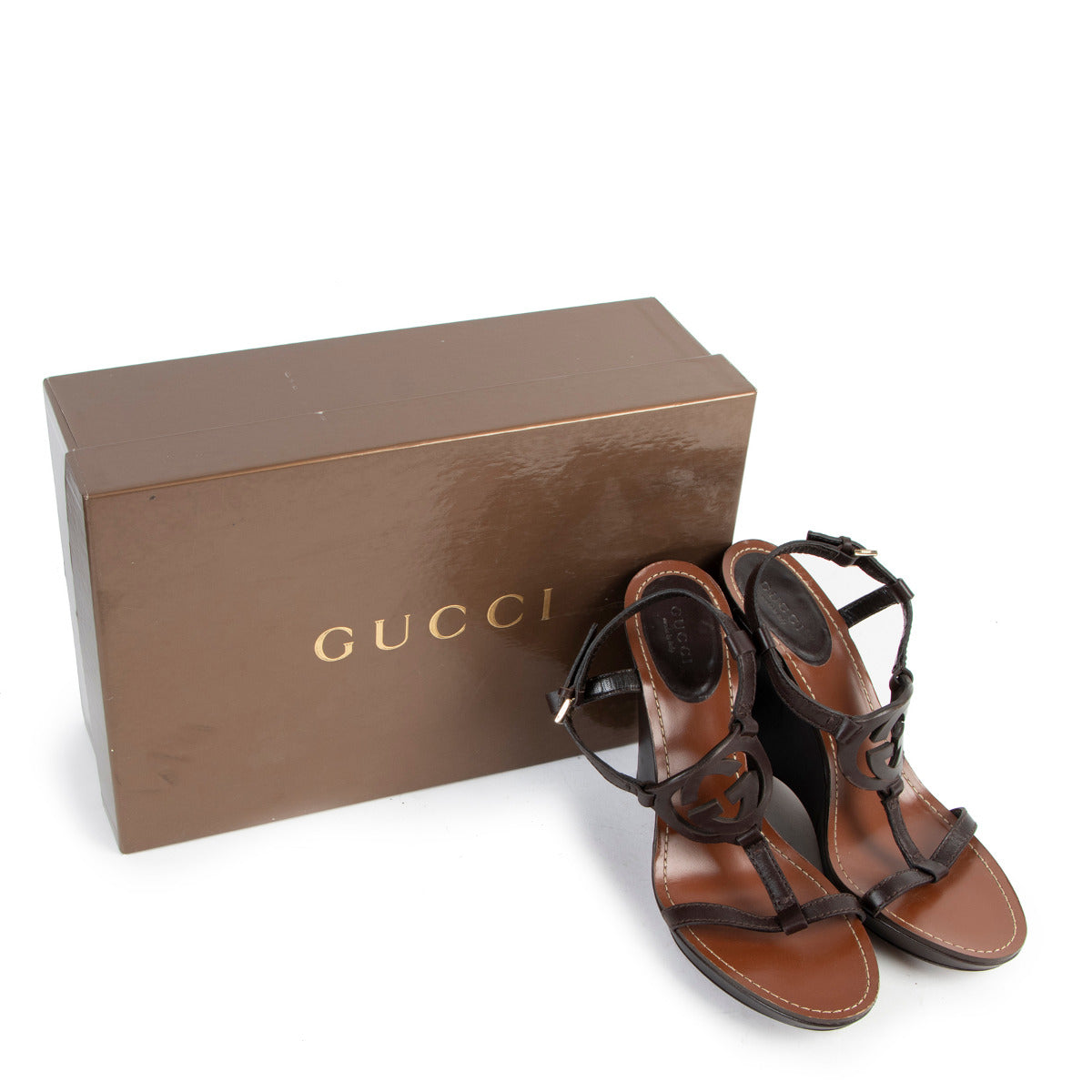 Gucci Brown Leather GG Wedge Sandals - Size 38 for the best price at Labellov secondhand luxury in Antwerp