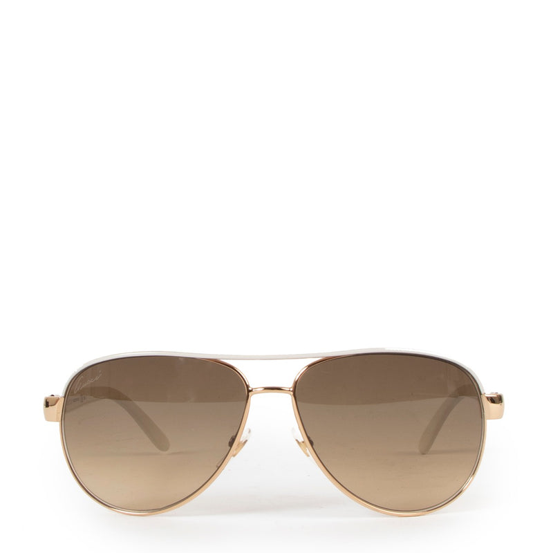 Shop safe online at Labellov in Antwerp these 100% authentic second hand Gucci White and Gold Aviator Sunglasses