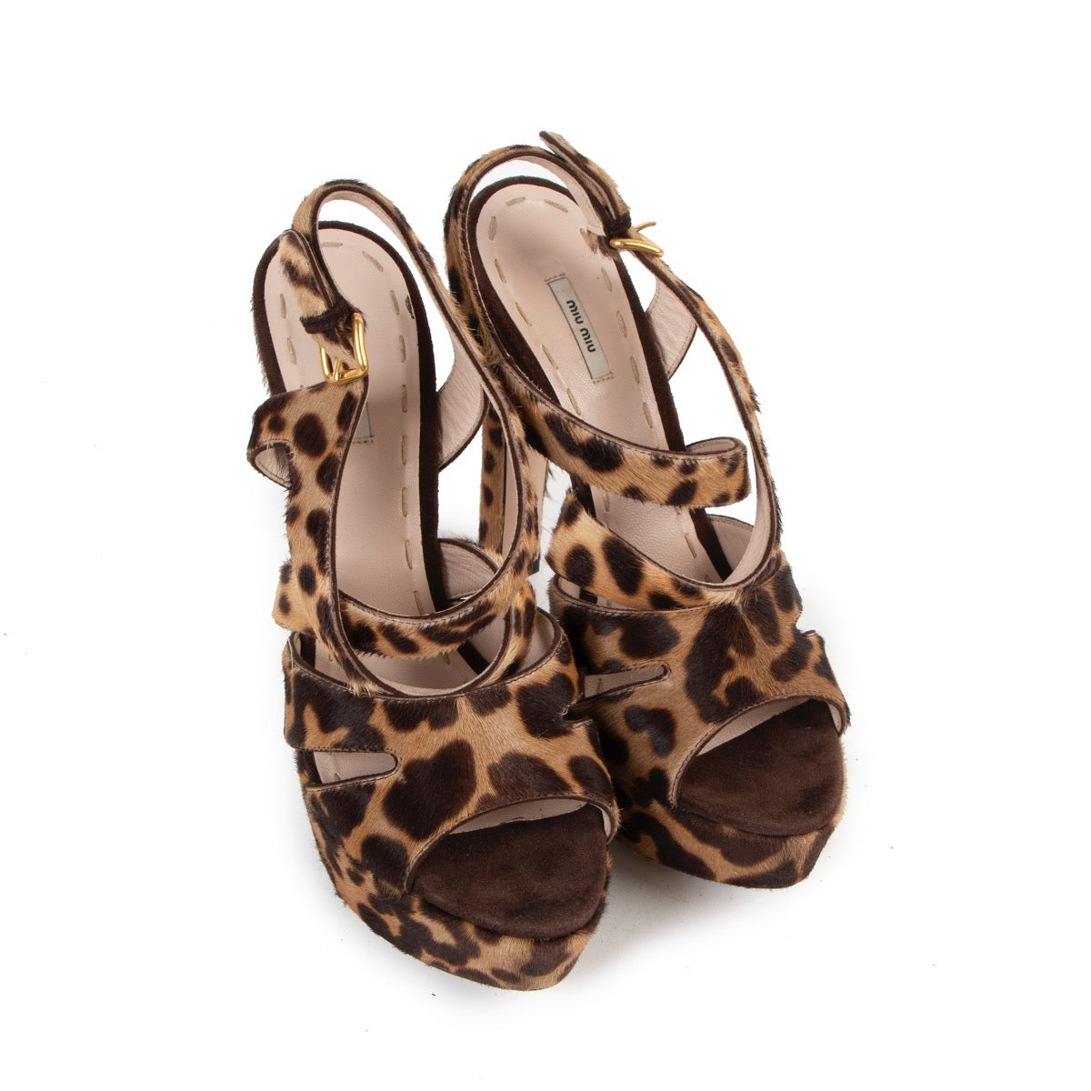 Buy online authentic second hand Miu Miu Leopard Ponyhair Platform Sandals in very good condition at Labellov in Antwerp.