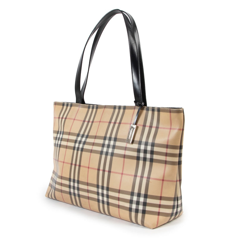 Buy this 100% authentic Burberry tote. Buy safely on our website.