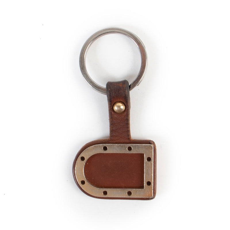 Buy an authentic second hand Delvaux Brown Key Chain at Labellov.