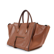 Shop now for your pre-loved, 100% authentic Céline Camel Luggage Phantom Top Handle at Labellov.