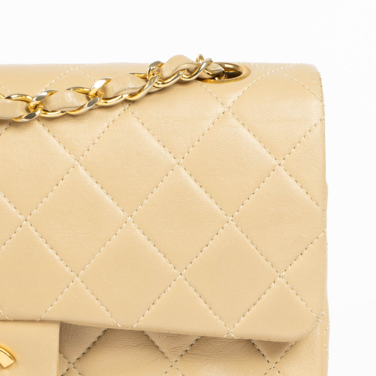 Shop this 100% authentic Chanel Beige Lambskin Small Classic Flap Bag with Gold Hardware at Labellov.com