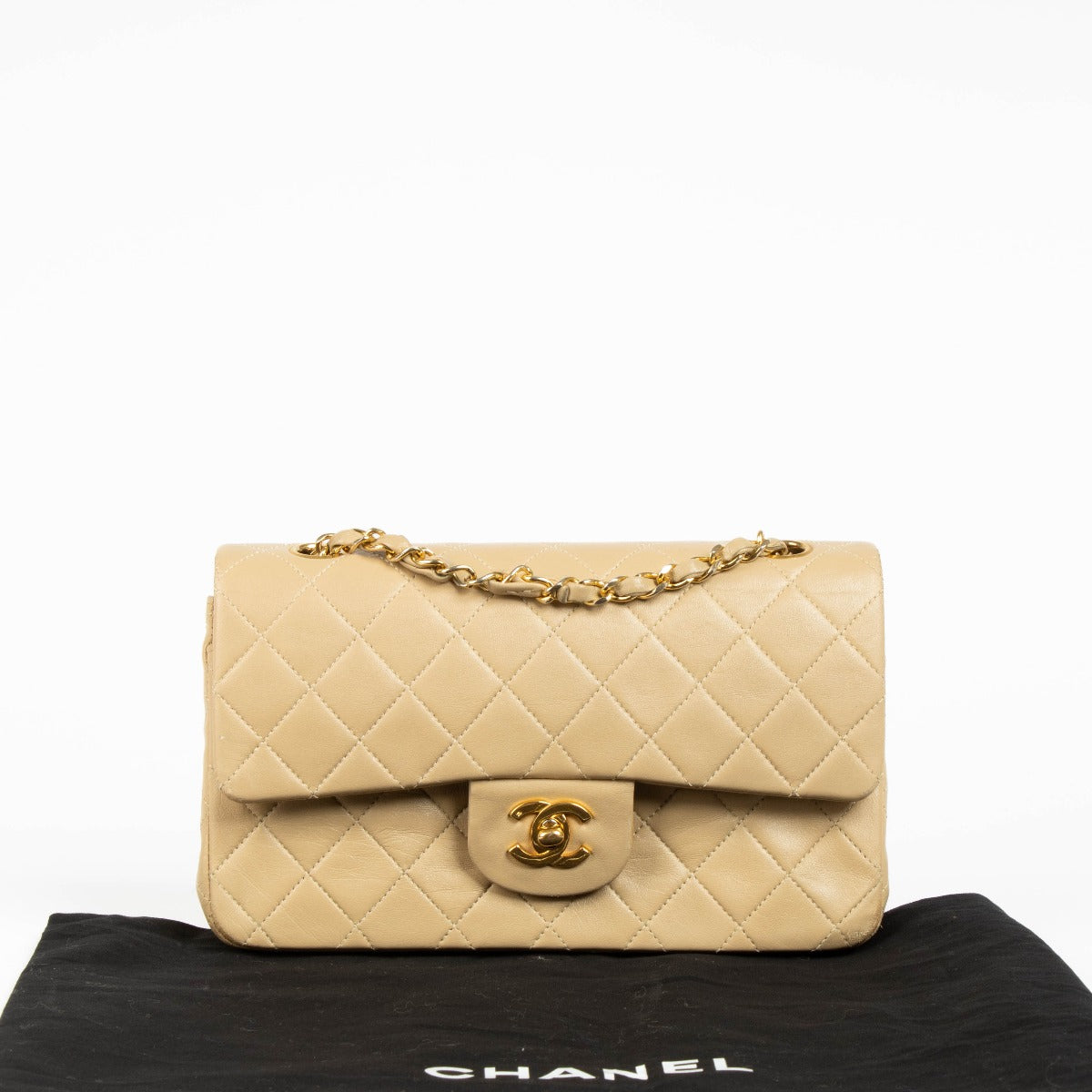 Shop this 100% authentic Chanel Beige Lambskin Small Classic Flap Bag with Gold Hardware at Labellov.com