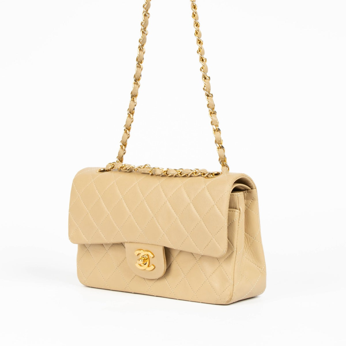 Shop this 100% authentic Chanel Beige Lambskin Small Classic Flap Bag with Gold Hardware at Labellov.com