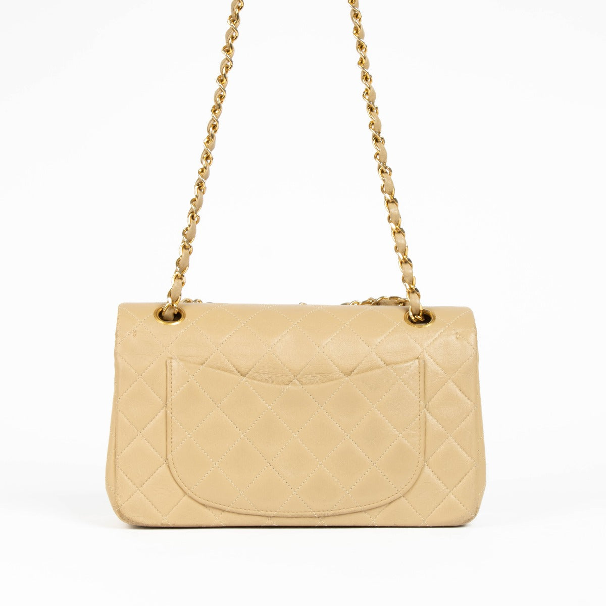 Shop this 100% authentic Chanel Beige Lambskin Small Classic Flap Bag with Gold Hardware at Labellov.com