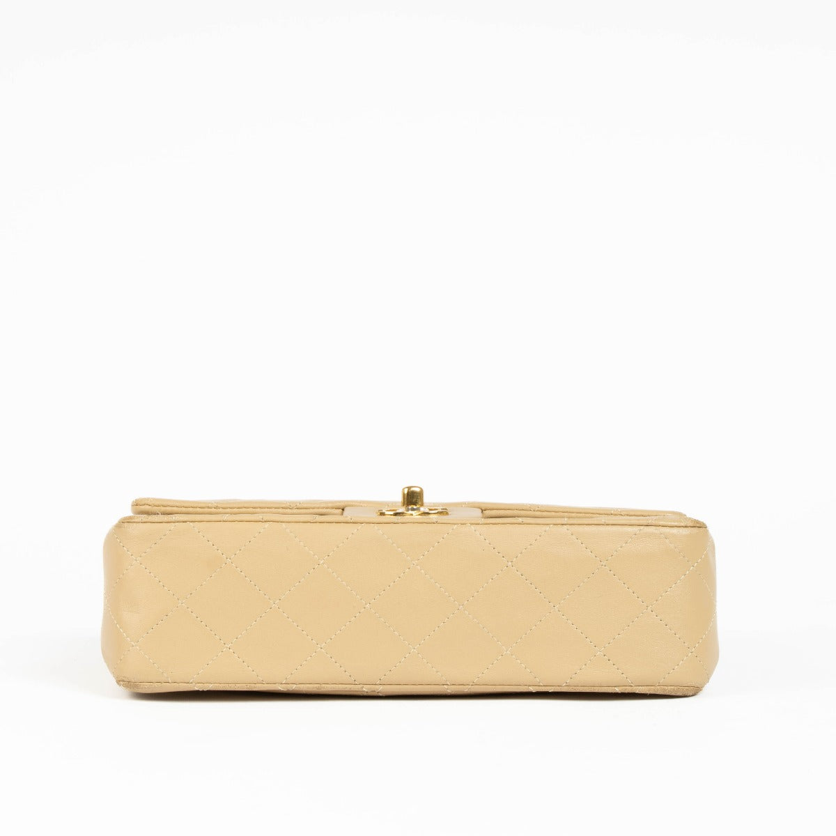 Shop this 100% authentic Chanel Beige Lambskin Small Classic Flap Bag with Gold Hardware at Labellov.com