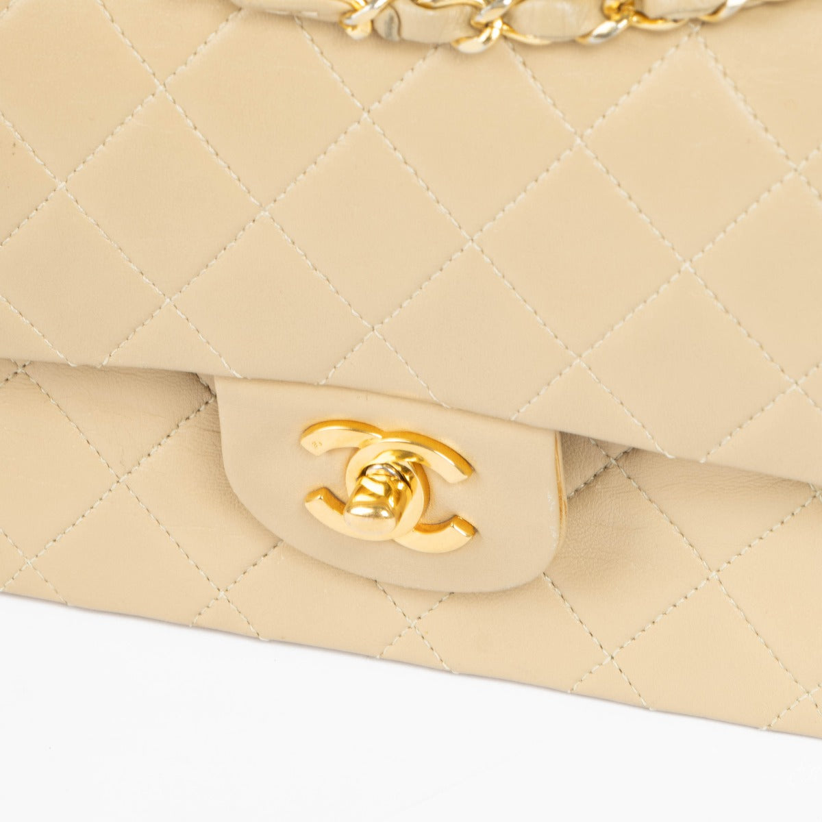 Shop this 100% authentic Chanel Beige Lambskin Small Classic Flap Bag with Gold Hardware at Labellov.com