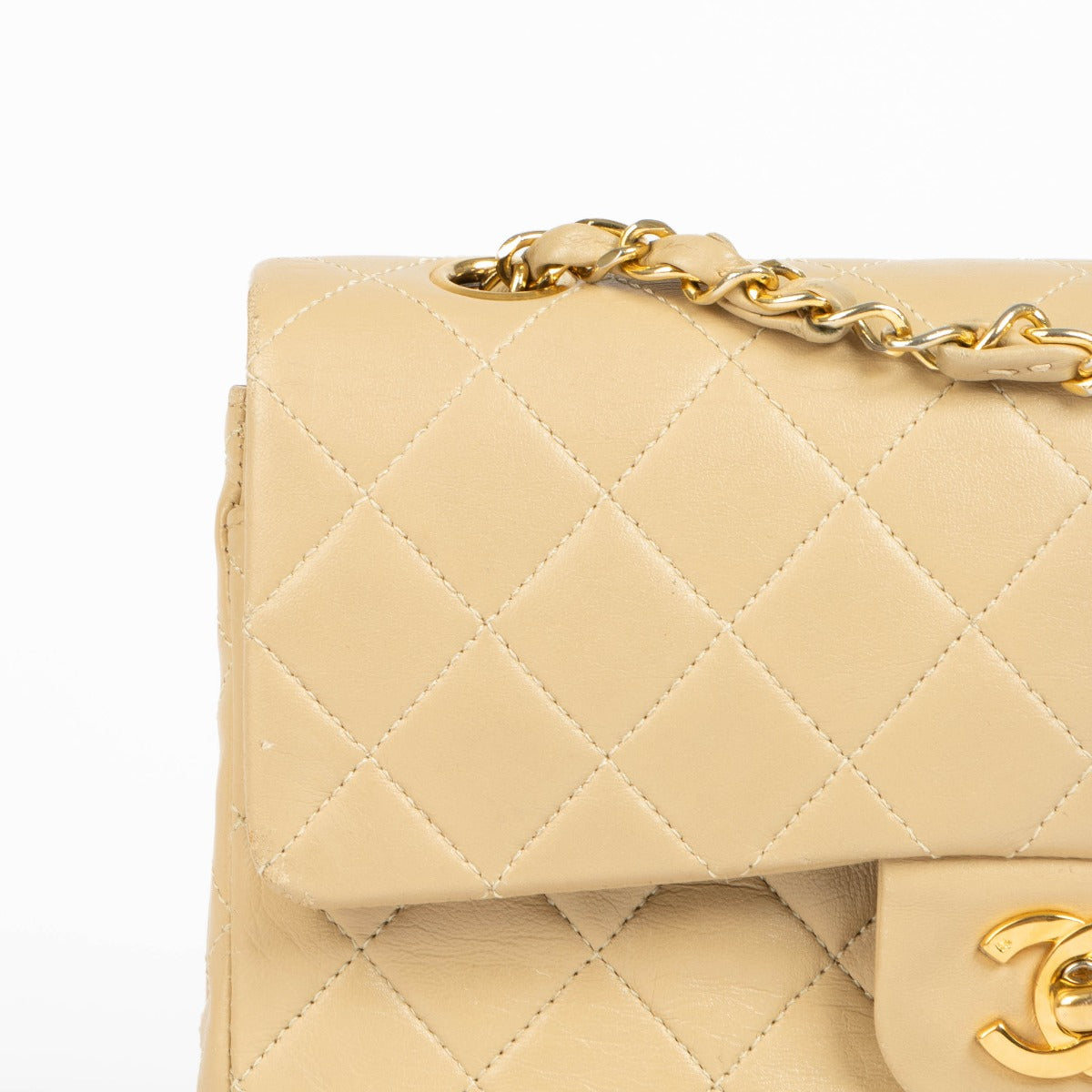 Shop this 100% authentic Chanel Beige Lambskin Small Classic Flap Bag with Gold Hardware at Labellov.com
