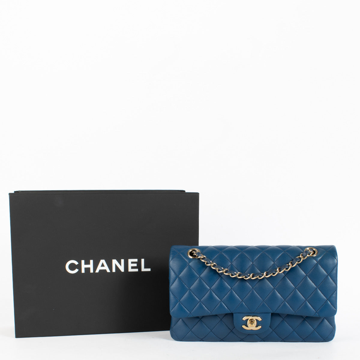 Authentic Chanel Blue Lambskin Classic Medium Flap 11.12 Bag second hand at Labellov.com