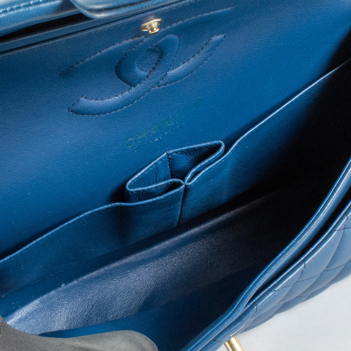 Authentic Chanel Blue Lambskin Classic Medium Flap 11.12 Bag second hand at Labellov.com