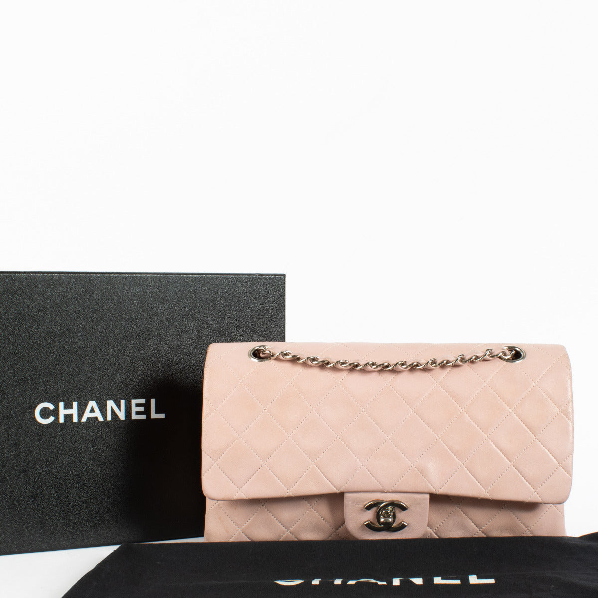 Authentic second-hand Chanel Vintage Pink Lambskin Classic Medium Flap Bag on labellov.com