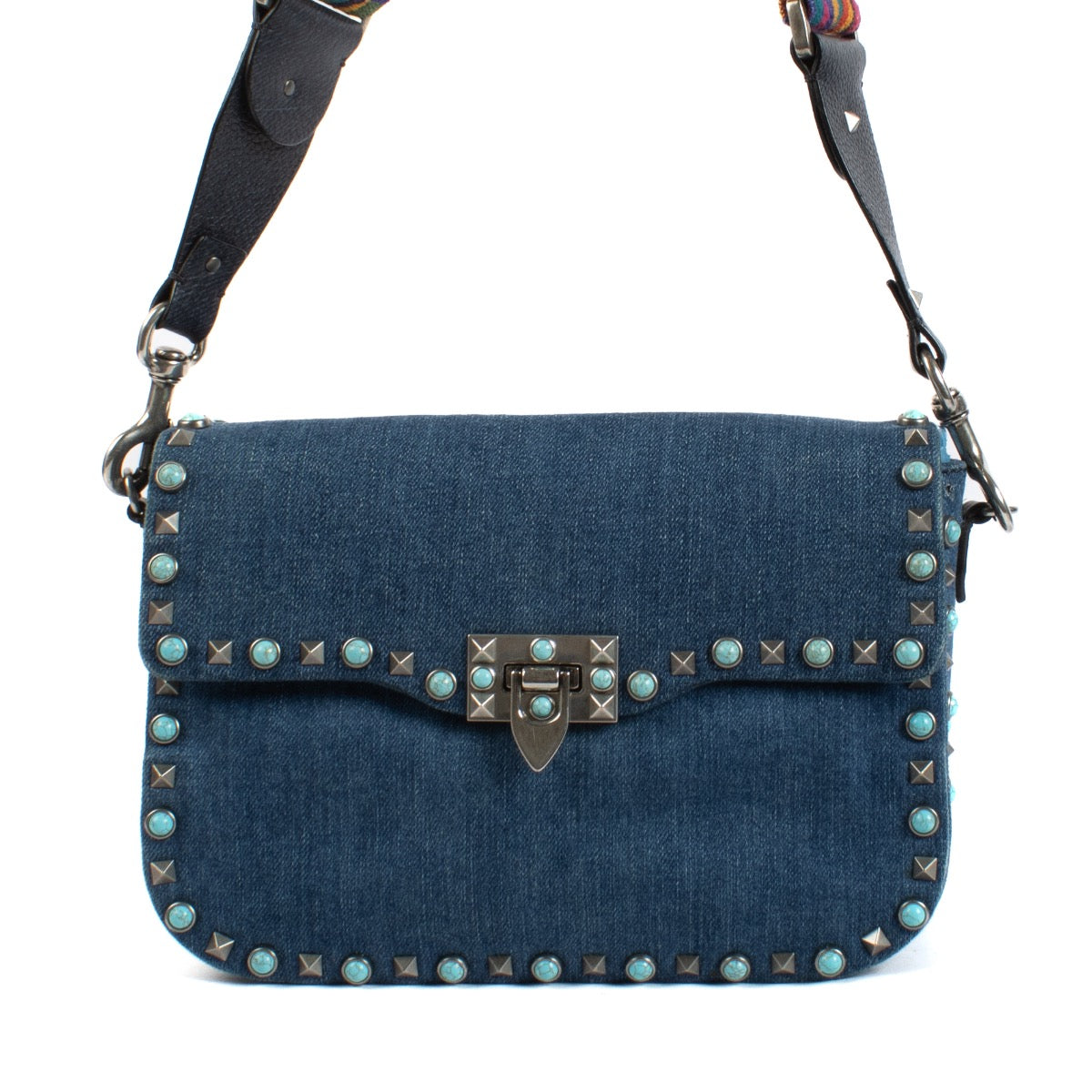 Shop safe online at Labellov in Antwerp and Knokke this 100% authentic second hand Valentino Garavani Denim Rockstud Rolling Rock Crossbody Bag
