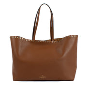 Shop safe online at Labellov in Antwerp and Knokke this 100% authentic second hand Valentino Garavani Vitello Tan Rockstud Tote Bag