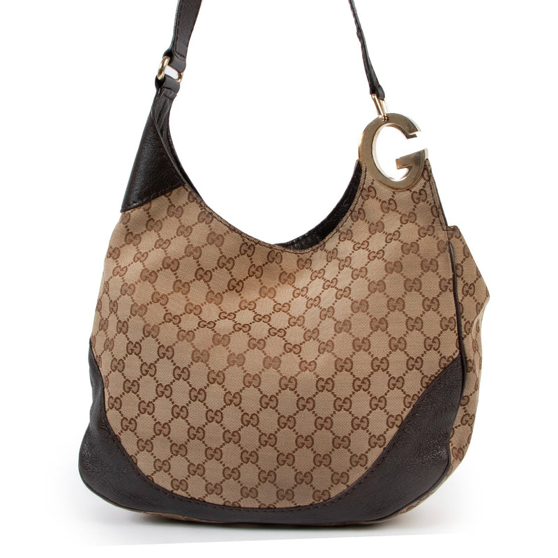Gucci GG Canvas Charlotte Hobo bag online for the best price , shop vintage safe online secondhand at Labellov
