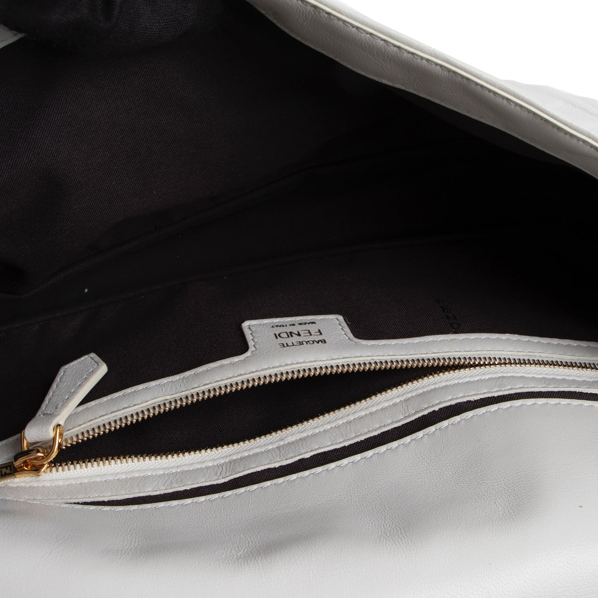 buy and sell your authentic designer Fendi White Baguette Shoulder Bag + Multicolor Wrappy for the best price at Labellov secondhand luxury in Antwerp.