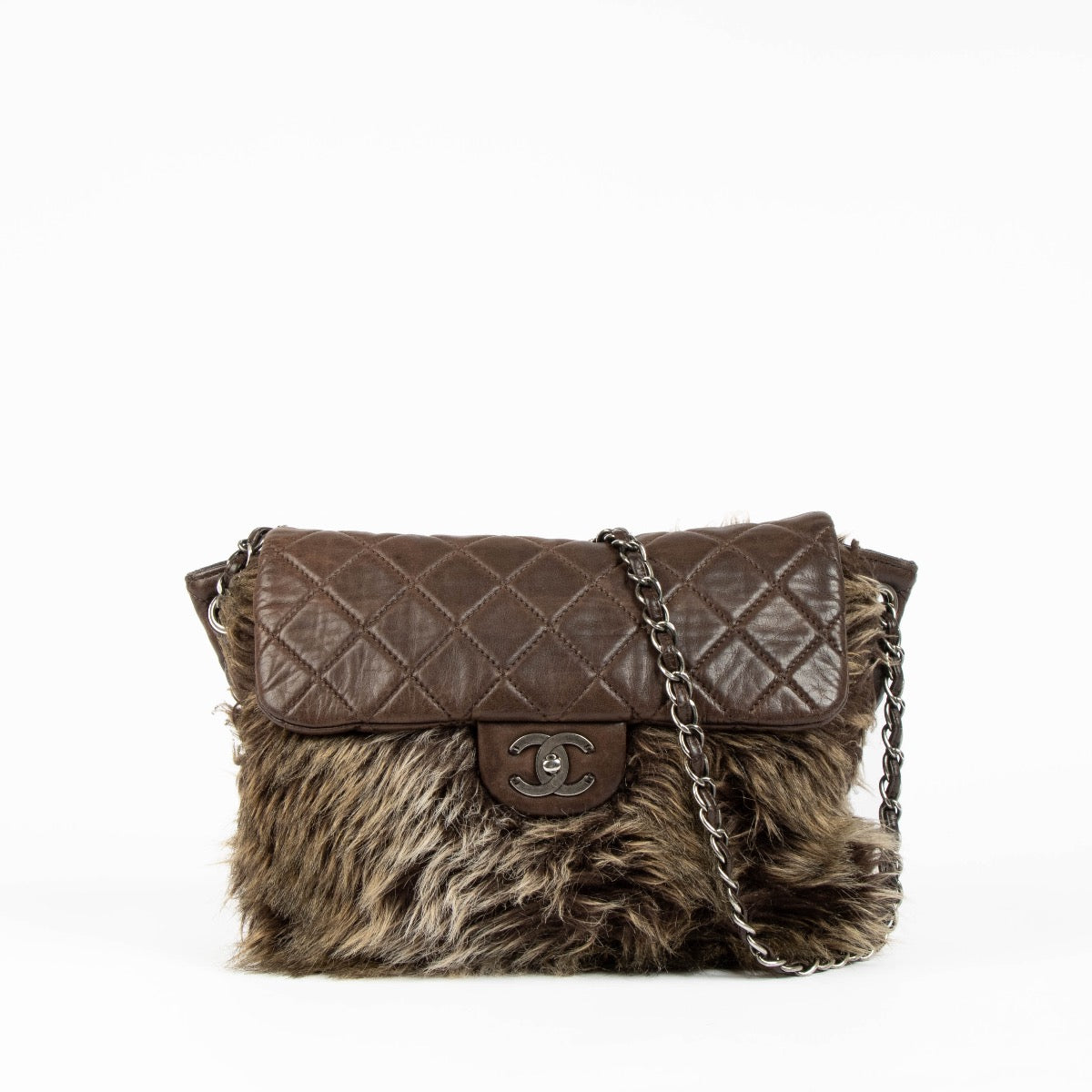 Authentic pre-loved Chanel Brown Quilted Lambskin Fur Flap Bag on Labellov.com