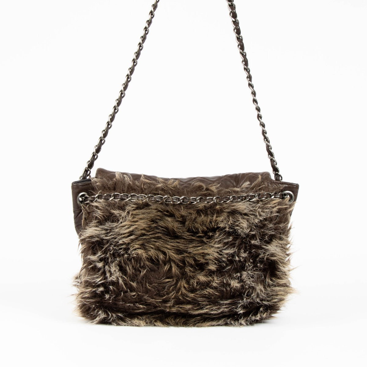 Authentic pre-loved Chanel Brown Quilted Lambskin Fur Flap Bag on Labellov.com