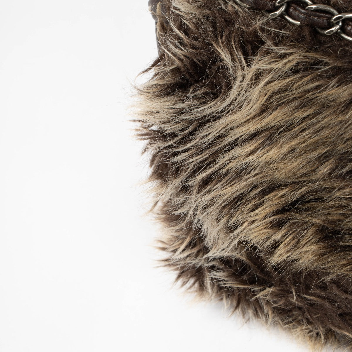 Authentic pre-loved Chanel Brown Quilted Lambskin Fur Flap Bag on Labellov.com