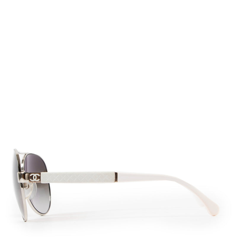 Buy an authentic pair of second hand Chanel aviator sunglasses at Labellov