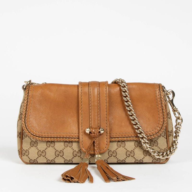 Authentic pre-loved Gucci GG Canvas Marrakech Chain Clutch on Labellov.com