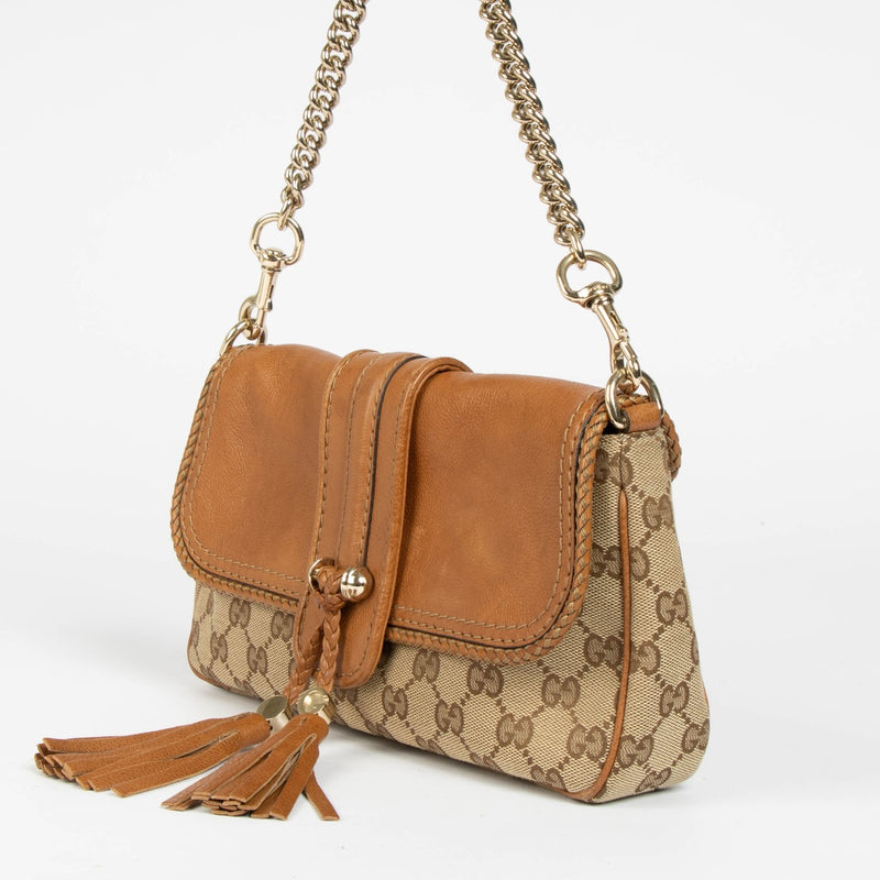 Authentic pre-loved Gucci GG Canvas Marrakech Chain Clutch on Labellov.com