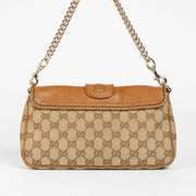 Authentic pre-loved Gucci GG Canvas Marrakech Chain Clutch on Labellov.com