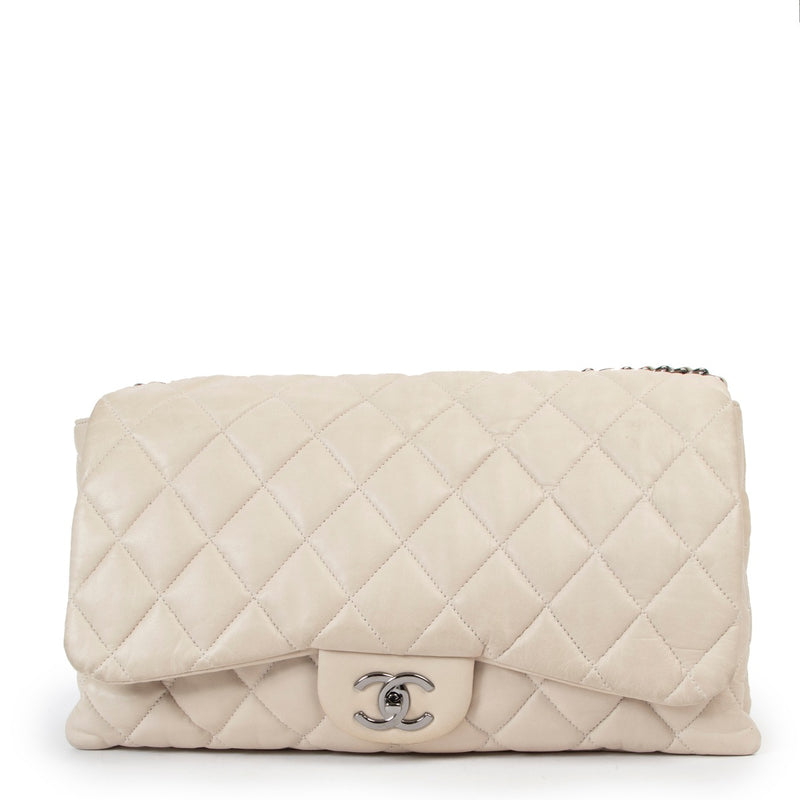 Buy an authentic second hand Chanel Grey Lambskin Quilted 3 Flap Bag in very good condition at Labellov