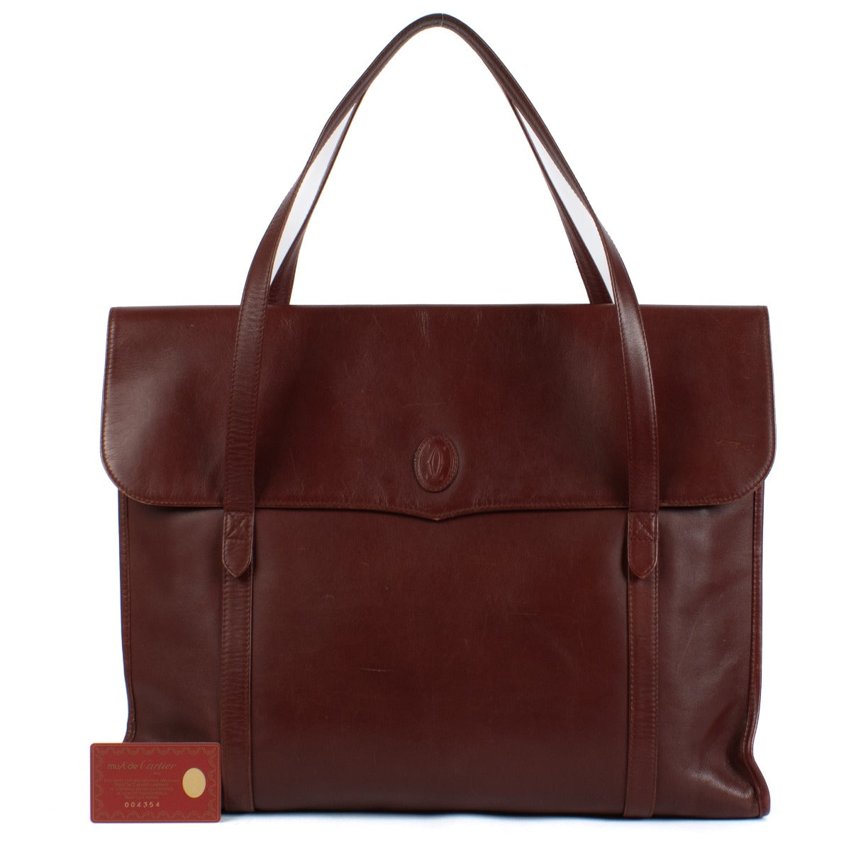 Shop safe online at Labellov in Antwerp, Brussels and Knokke this 100% authentic second hand Cartier Burgundy Vintage Tote Bag