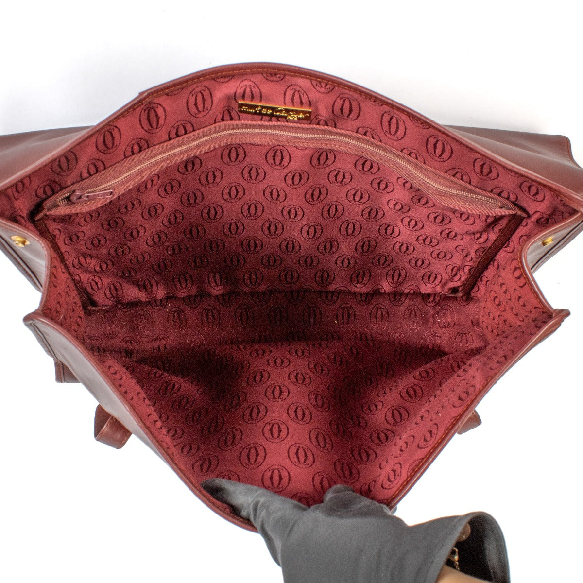 Shop safe online at Labellov in Antwerp, Brussels and Knokke this 100% authentic second hand Cartier Burgundy Vintage Tote Bag