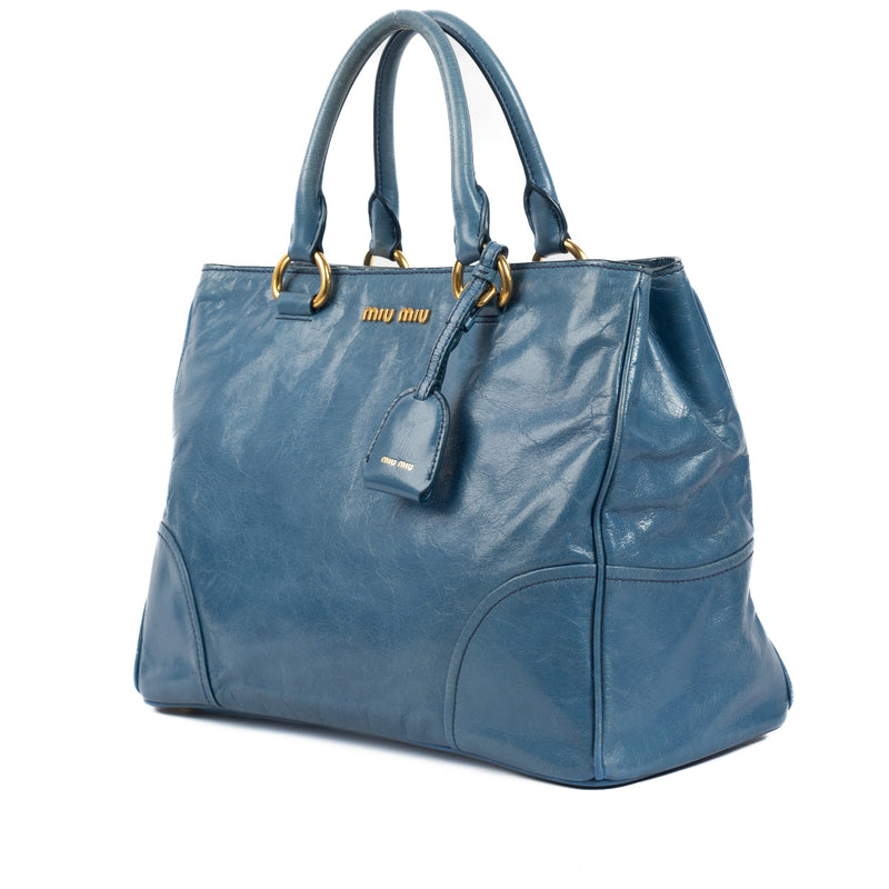 Miu Miu Teal Blue Leather Satchel pour le meilleur prix chez Labellov à Anvers. Acheter avec confiance.