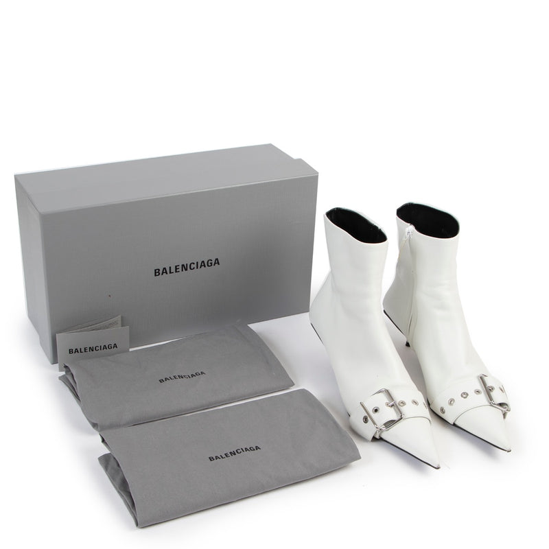 Buy an authentic pair of second hand Balenciaga white belt leather ankle boots size 40 at Labellov