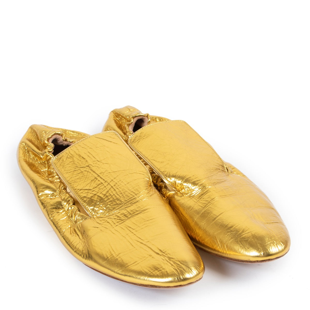Buy an authentic pair of second hand Dries Van Noten Gold Loafers size 40,5 at Labellov