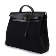 Buy an authentic second hand Hermès Black Herbag 2-in-1 Top Handle at Labellov