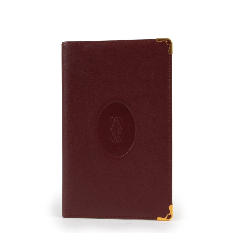 Cartier Long Burgundy Notebook Wallet Buy this gorgeous 100% authentic piece here!