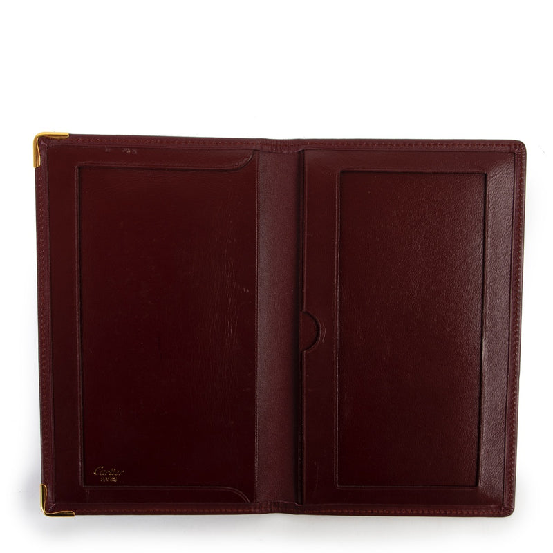 Cartier Long Burgundy Notebook Wallet Buy this gorgeous 100% authentic piece here!