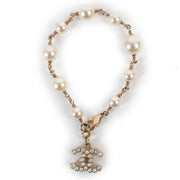 Buy an authentic second hand Chanel faux white pearls bracelet at Labellov