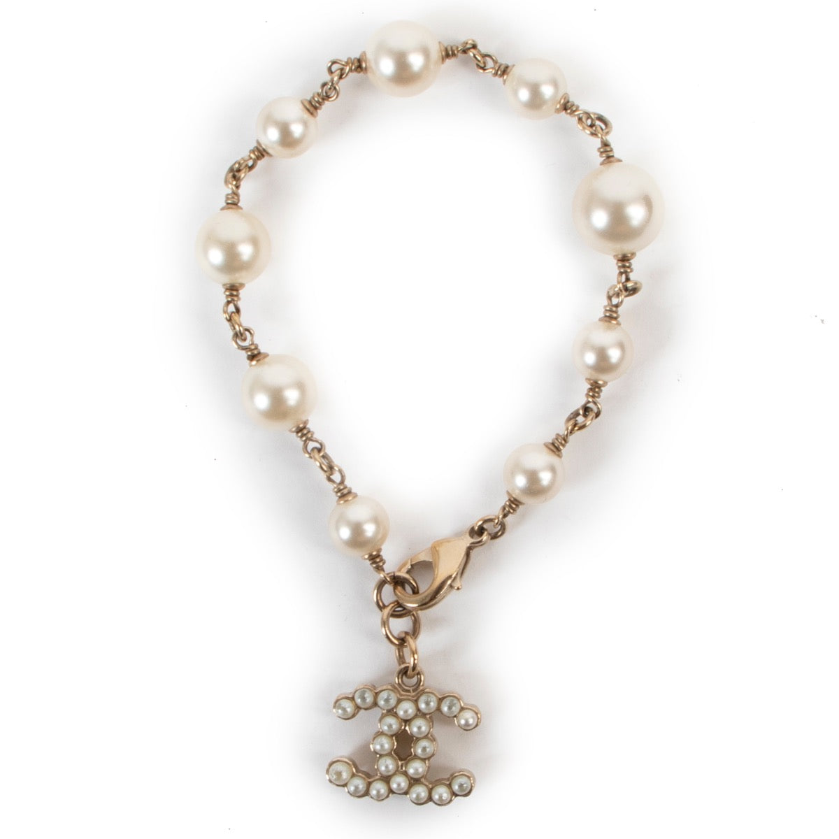 Buy an authentic second hand Chanel faux white pearls bracelet at Labellov