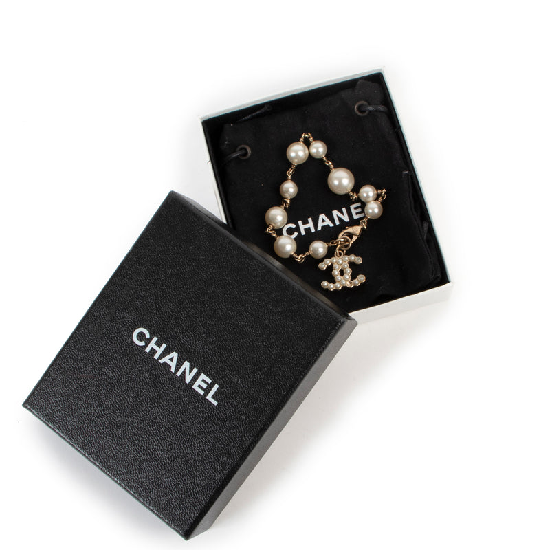 Buy an authentic second hand Chanel faux white pearls bracelet at Labellov