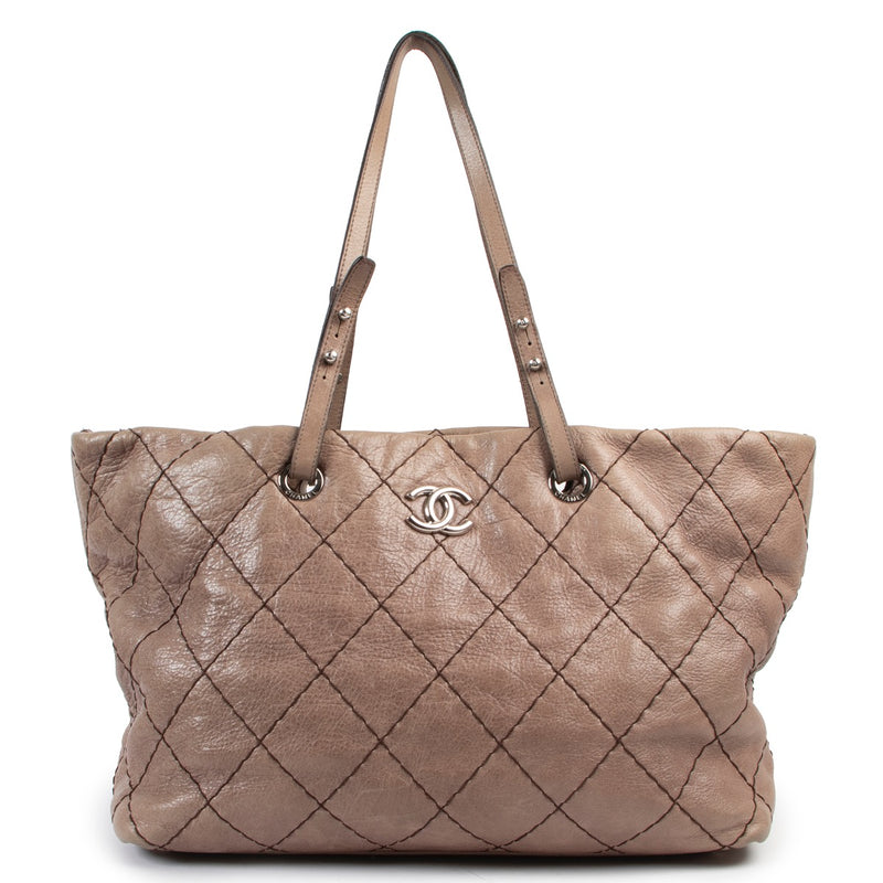 Shop safe online at Labellov in Antwerp this 100% authentic second hand Chanel Taupe Quilted Glazed Leather On-The-Road Shoulder Bag