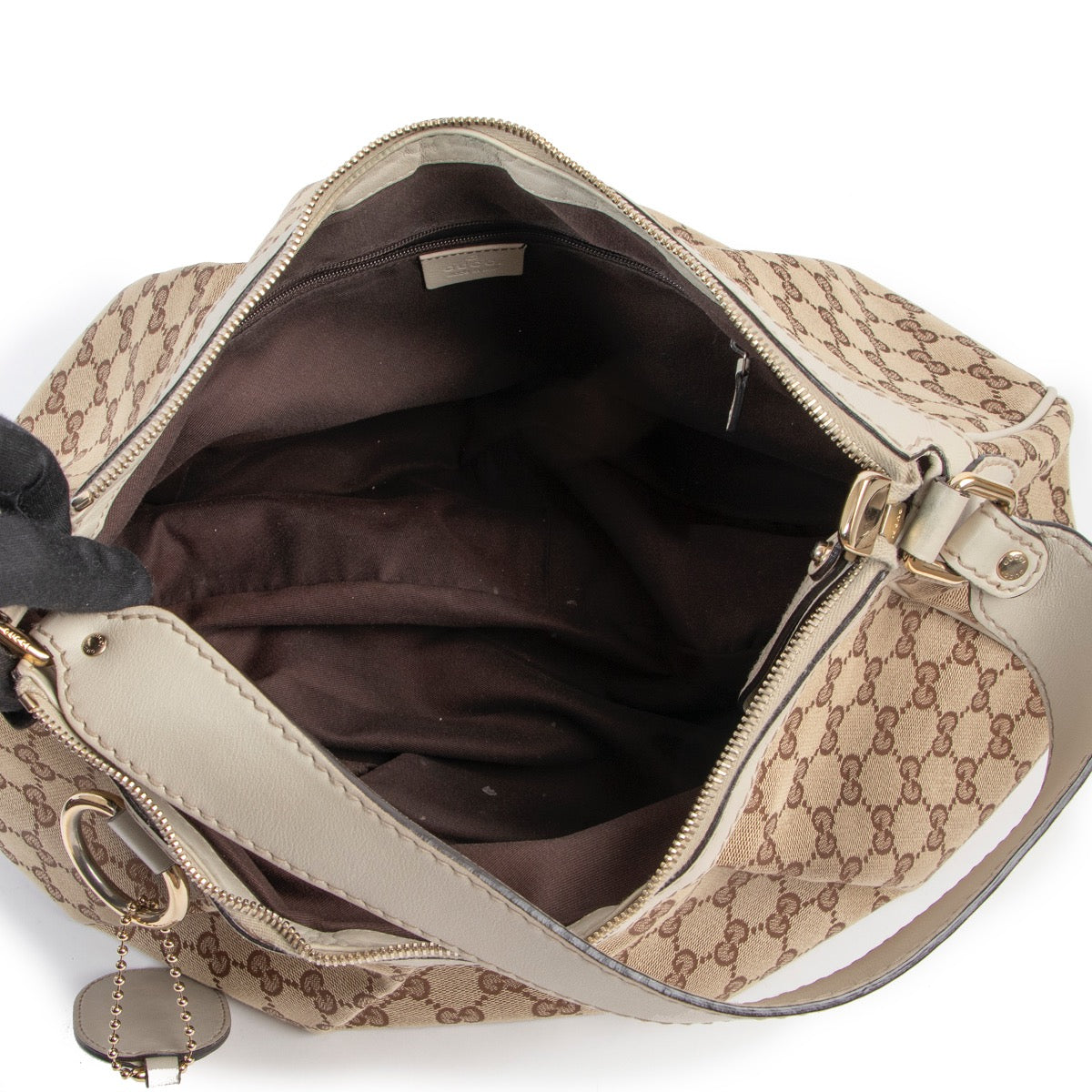 Shop safe online at Labellov in Antwerp this 100% authentic second hand Gucci Monogram Canvas Shoulder Bag