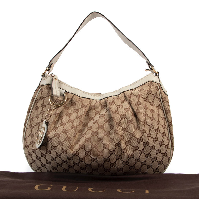 Shop safe online at Labellov in Antwerp this 100% authentic second hand Gucci Monogram Canvas Shoulder Bag