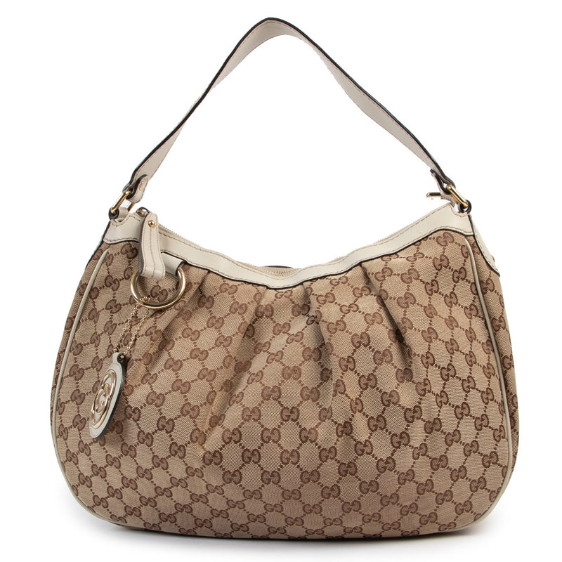 Shop safe online at Labellov in Antwerp this 100% authentic second hand Gucci Monogram Canvas Shoulder Bag