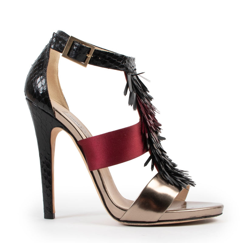Shop safe online at Labellov in Antwerp this 100% authentic second hand Jimmy Choo Black and Red Pumps - size 38