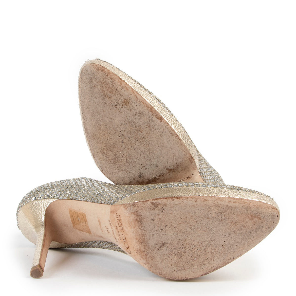Buy second hand authentic Jimmy Choo Crown Champagne Gold Glitter Pumps at Labellov for the best price